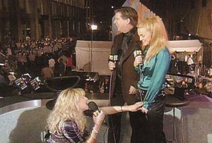 Courtney Love Doesn't Let Madonna & Kurt Loder Finish (1995) -The most exciting moment of the '95 VMAs actually took place offstage, once the show was over, when loose-cannon rock widow Courtney Love hijacked VJ Kurt Loder's perfectly civilized interview with elder stateswoman Madonna. (Courtney got Loder's attention by tossing her powder compact into the press pit.) A lesser pop star may have been intimidated by Courtney's crazy antics. But Courtney was no match for Madge, who in a refreshing change of pace came across as classy and totally non-controversial, smiling benignly while Courtney struggled to remain upright and babbled about Michael Stipe and Birkenstocks. This was live television at its finest.